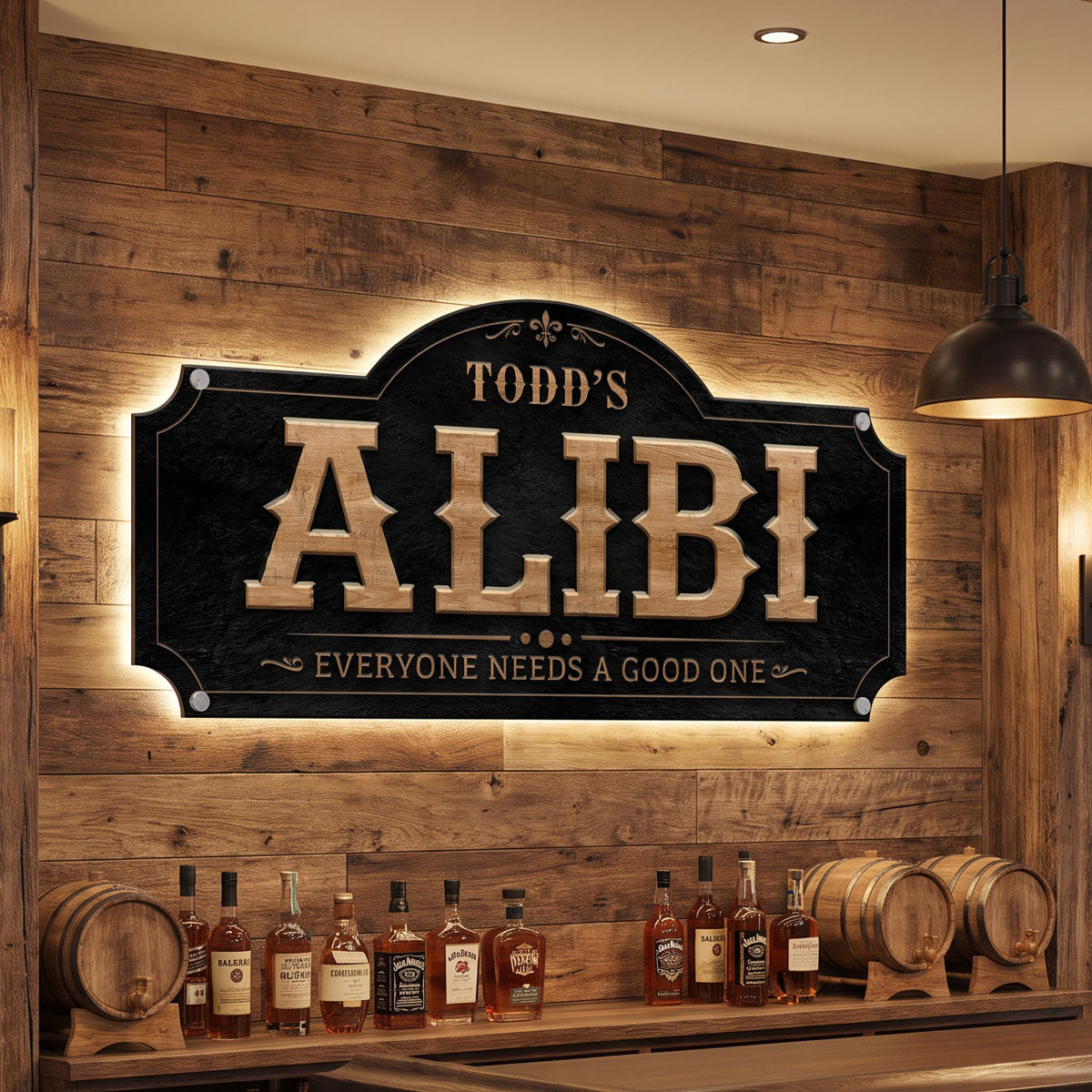 Personalized man cave bar sign Todd's Alibi backlit on a reclaimed wood wall above a lit whiskey bottle shelf