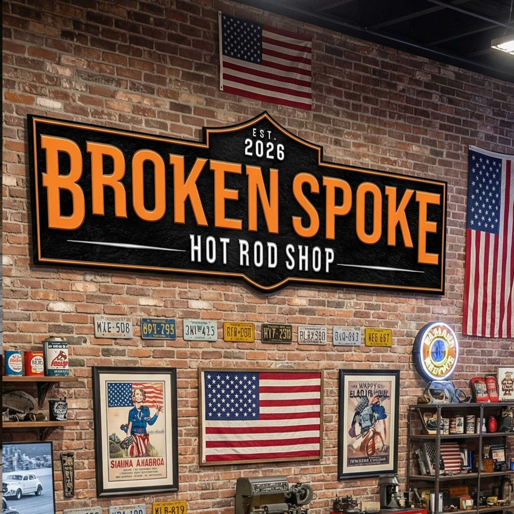 garage sign man cave sign on brick wall adorned with american flags.