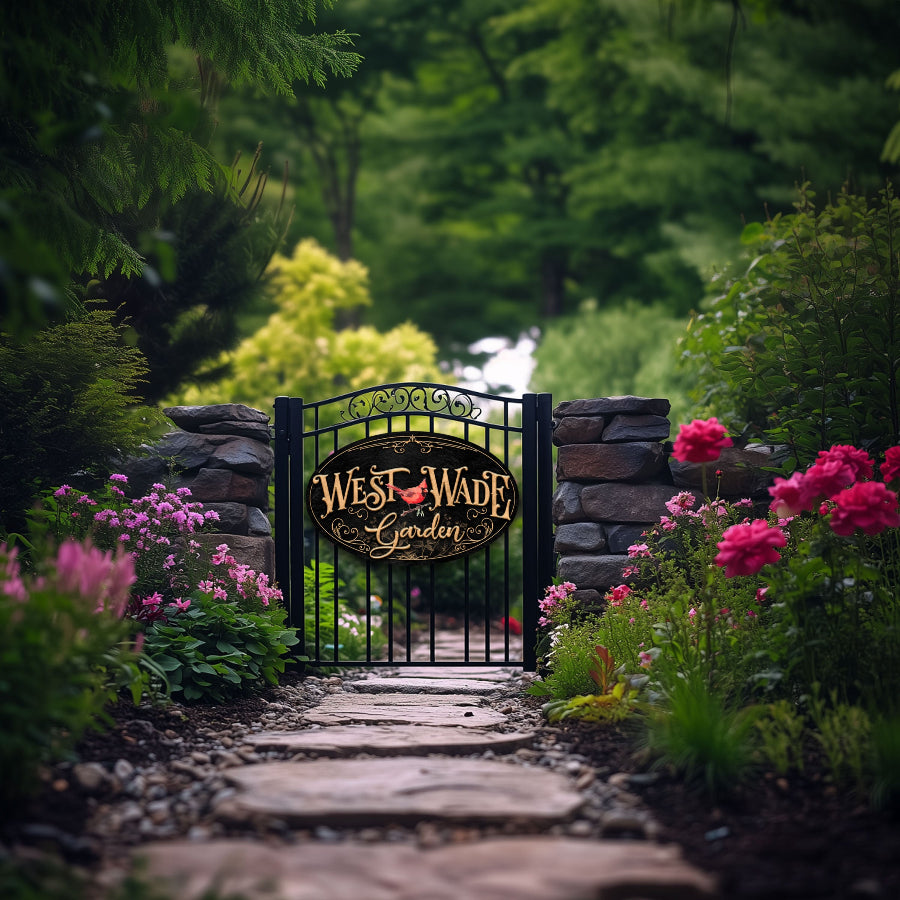 gardening sign for gates and gardens on black textured oval with red cardinal