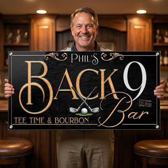 golf gift of a man holding his Back 9 Personalized sign.