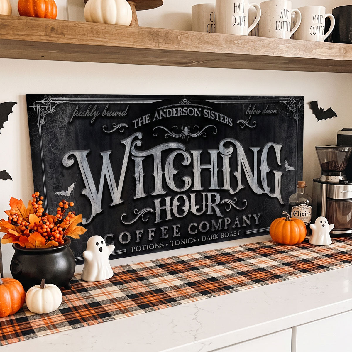 Witching Hour coffee sign on a kitchen shelf with mugs, bats, pumpkins and autumn florals