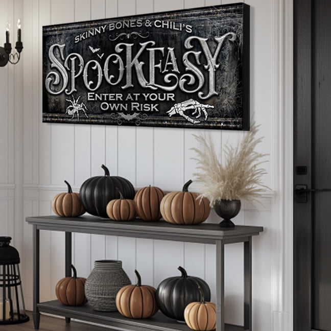 halloween sign spookeasy decor with black textured background and the words spookeasy under  personalized name.