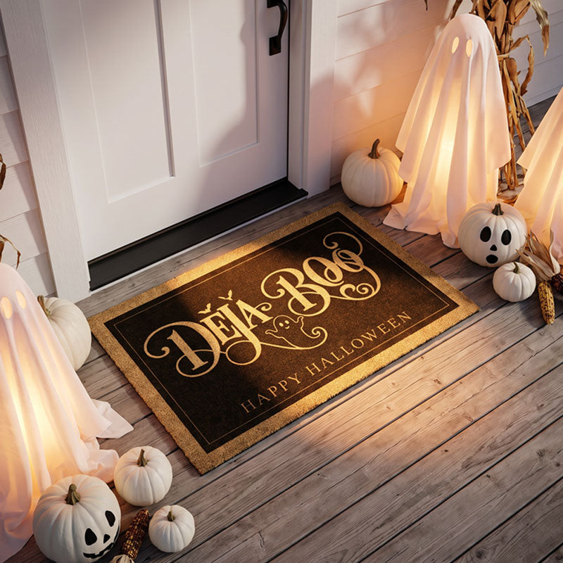 Happy Halloween ghost doormat on a wood porch with white pumpkins and glowing ghosts