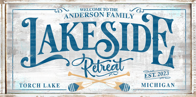 Lake house wall decor sign with family name and the words Lakeside Retreat