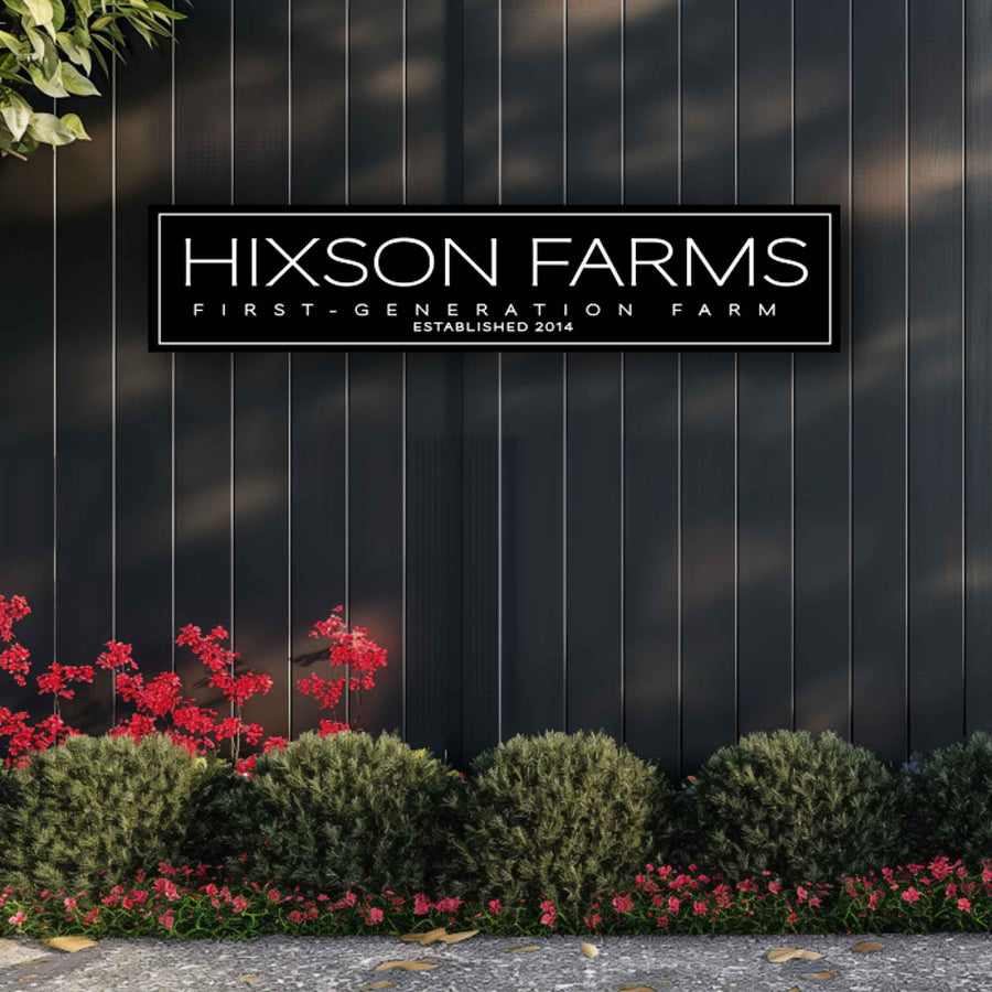 large metal farm signs with black background and white lettering