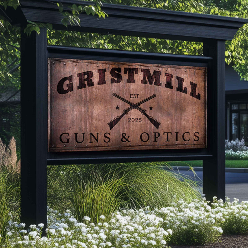 Business Signs metal with a rusty look with words Gristmill Guns and optics