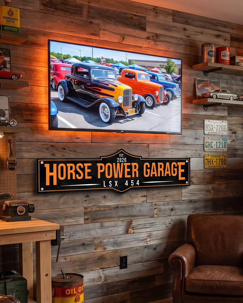 Metal garage man cave sign on a reclaimed wood wall with license plates above a workbench and TV