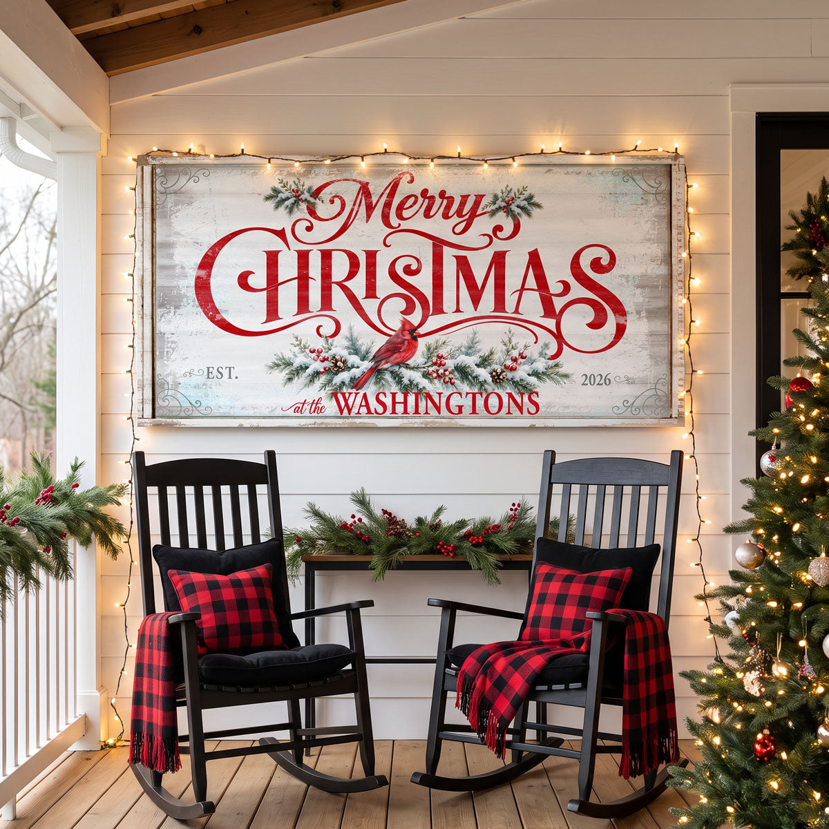 Personalized Merry Christmas sign on a covered porch above black rocking chairs with buffalo check pillows and string lights