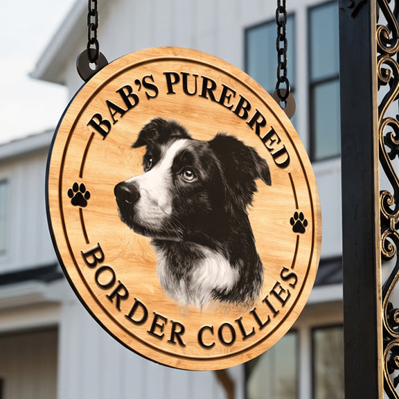 metal ranch entrance signs - Wooden look- sign with a border collie illustration and text 'Bab's Purebred Border Collies' on a building exterior.