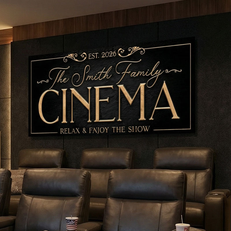 Personalized movie room decor cinema sign on a wall with leather theater seats below.