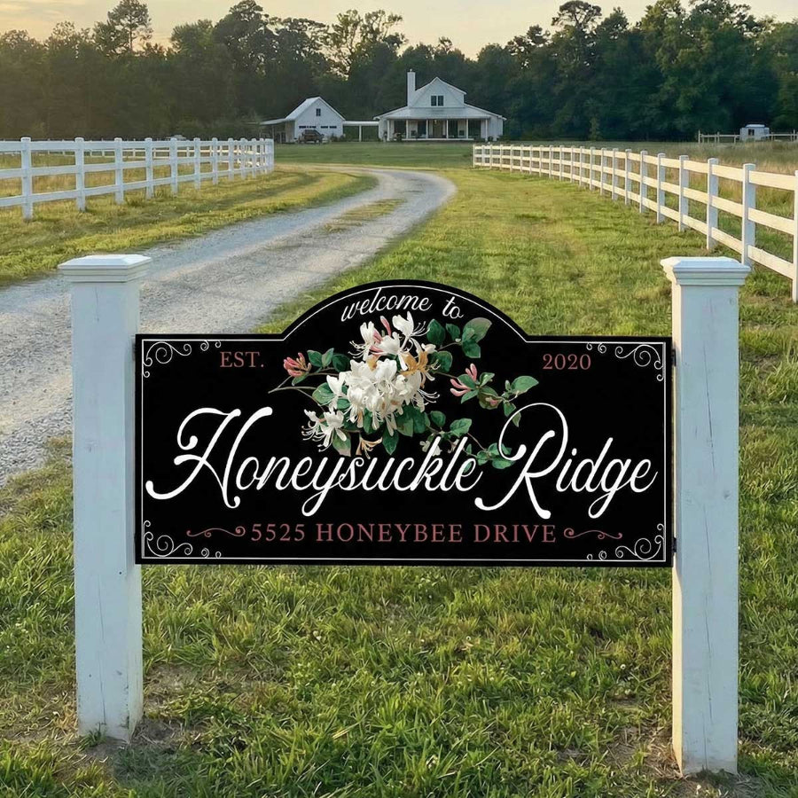 outdoor entrance sign at the end of the driveway of a farm