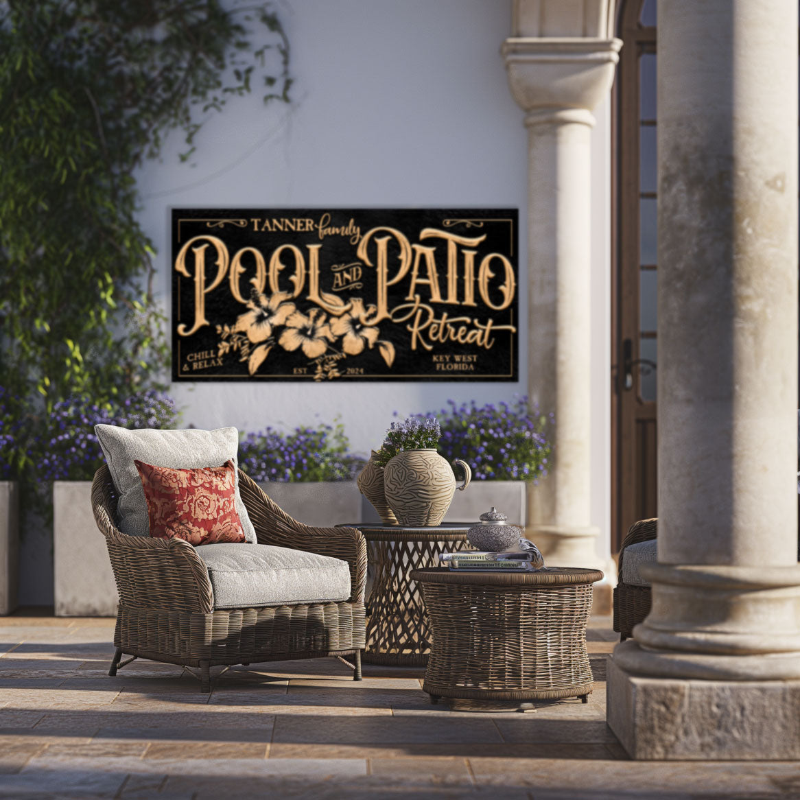 Pool wall decor sign that is on black textured background with the words Pool and Patio display large with flowers underneath and personalization of name and city and state.