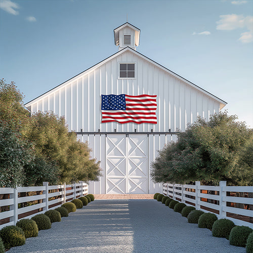 Patriotic sign the us flag displayed boldly on a white barn