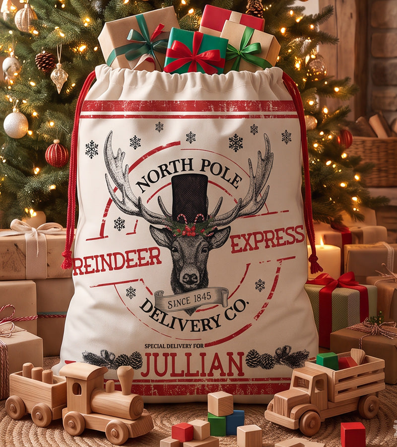 Personalized Christmas gift bag with a vintage stag engraving, packed with gifts and wooden toys