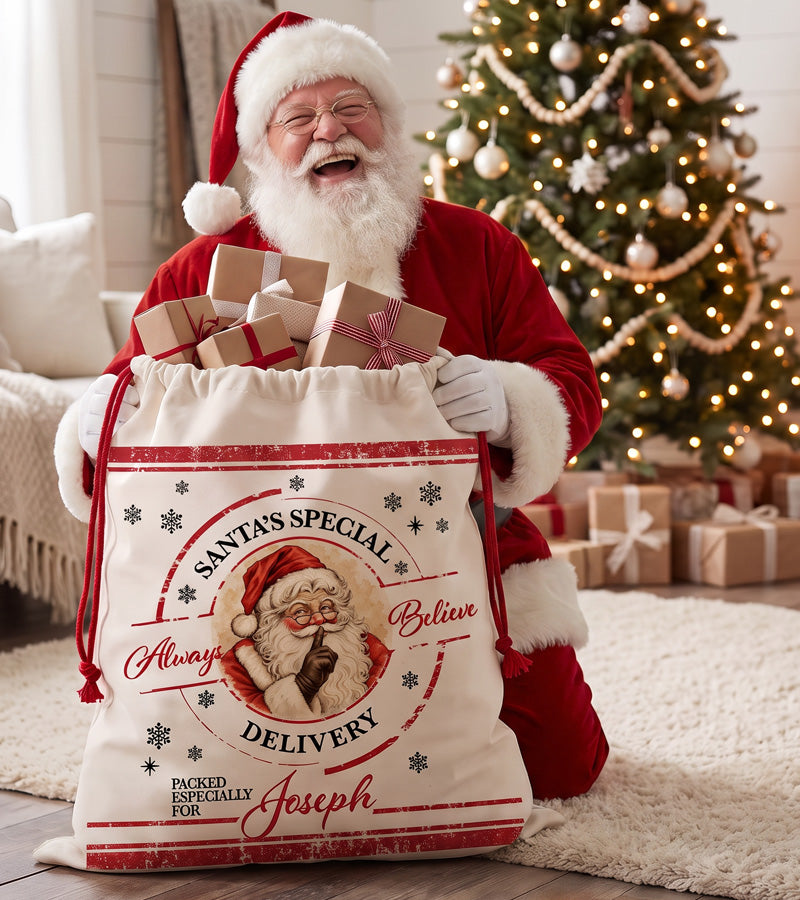 Personalized Christmas gift bag with a hand painted Santa and a name in red script