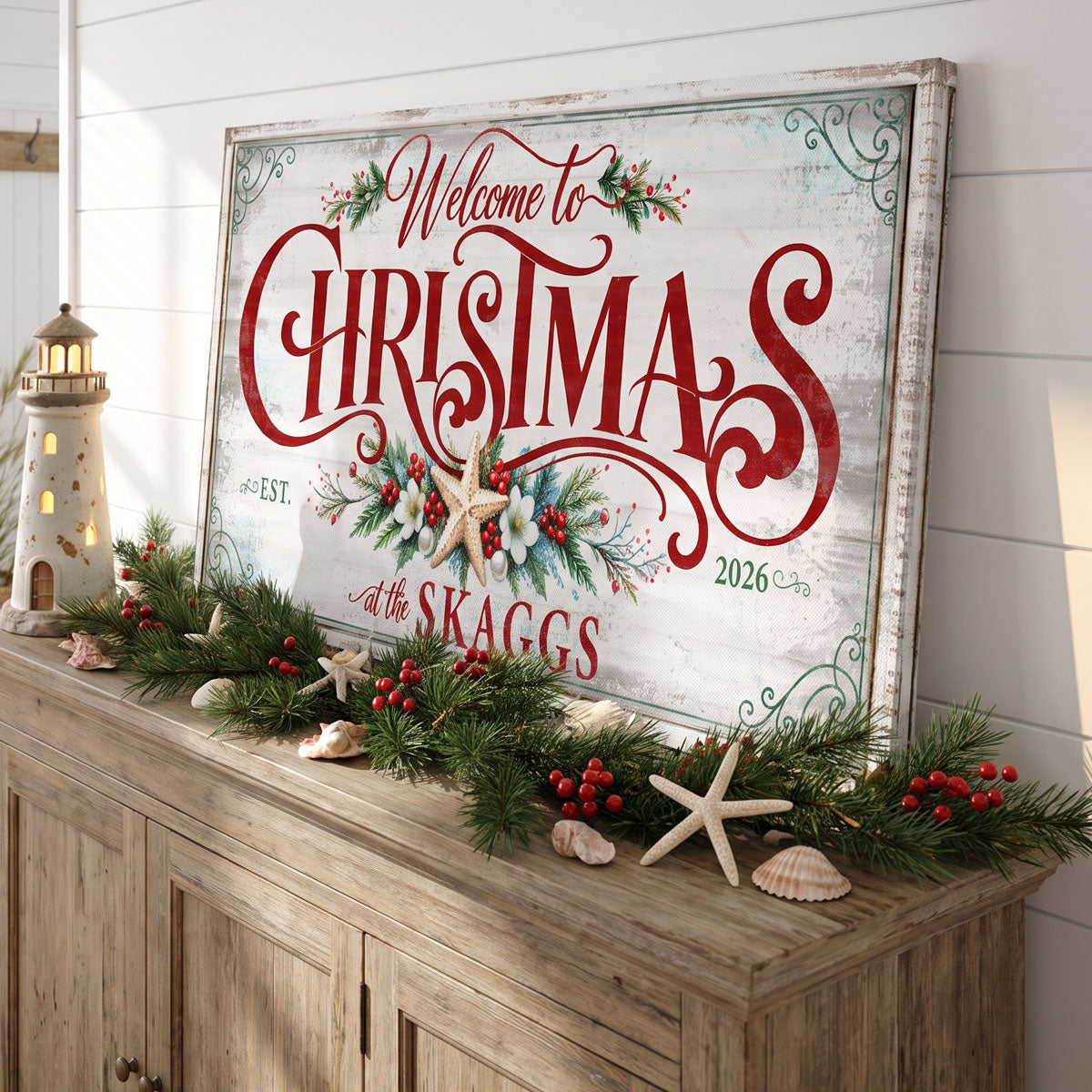 Family name Christmas sign on a weathered wood console with a lighthouse, lantern and starfish