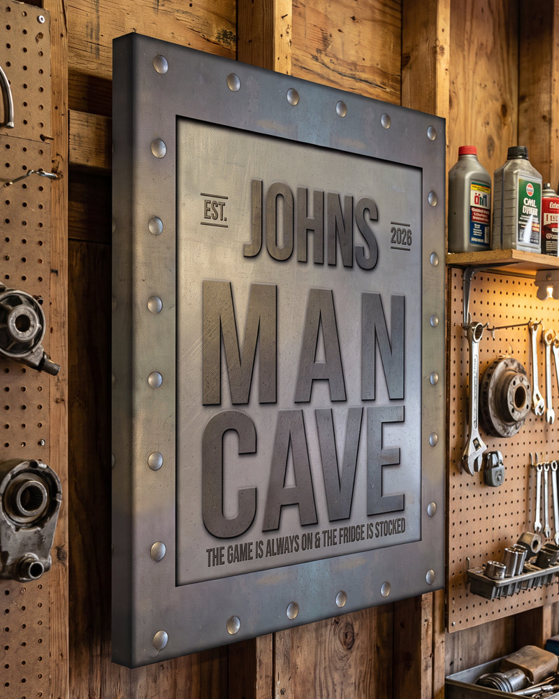 Personalized man cave sign with custom name and est. year, industrial rivet frame, in a wood workshop