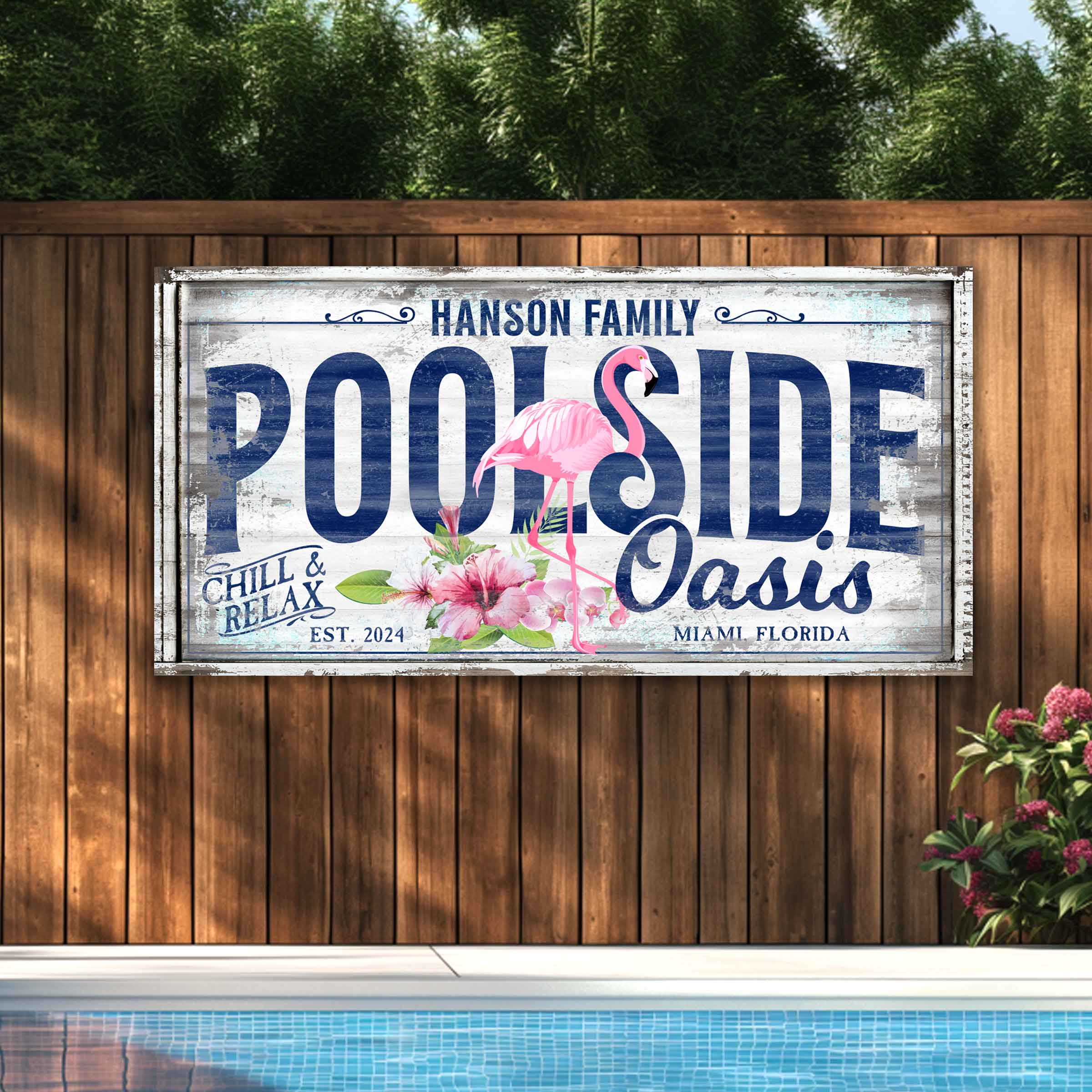 personalized pool sign  on white washed background with the words poolside Oasis featuring a pink flamingo.