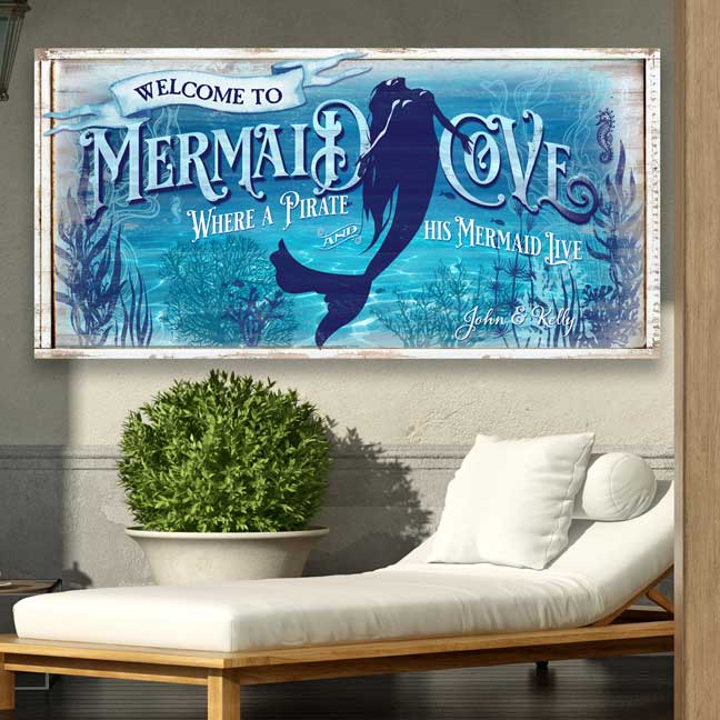 pool and patio sign with a mermaid surfacing to the top of the water with the words Welcome to mermaid cove.