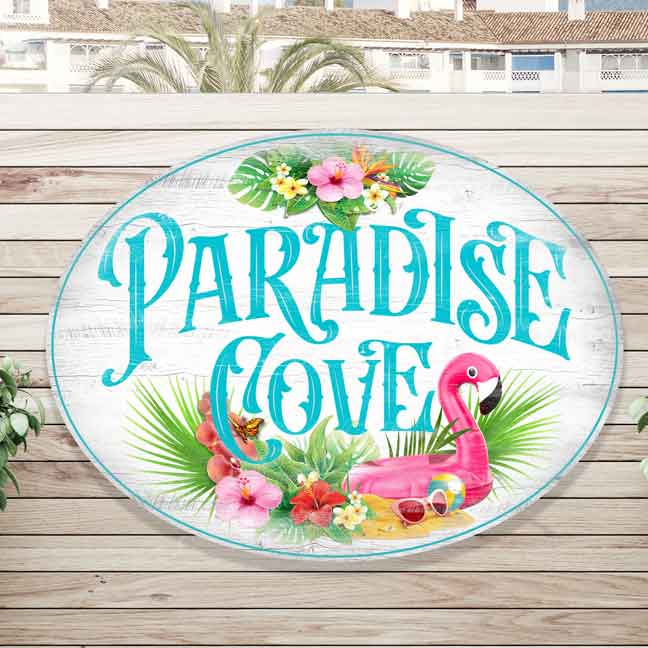 pool and patio decor with a flamingo and the words paradise cove