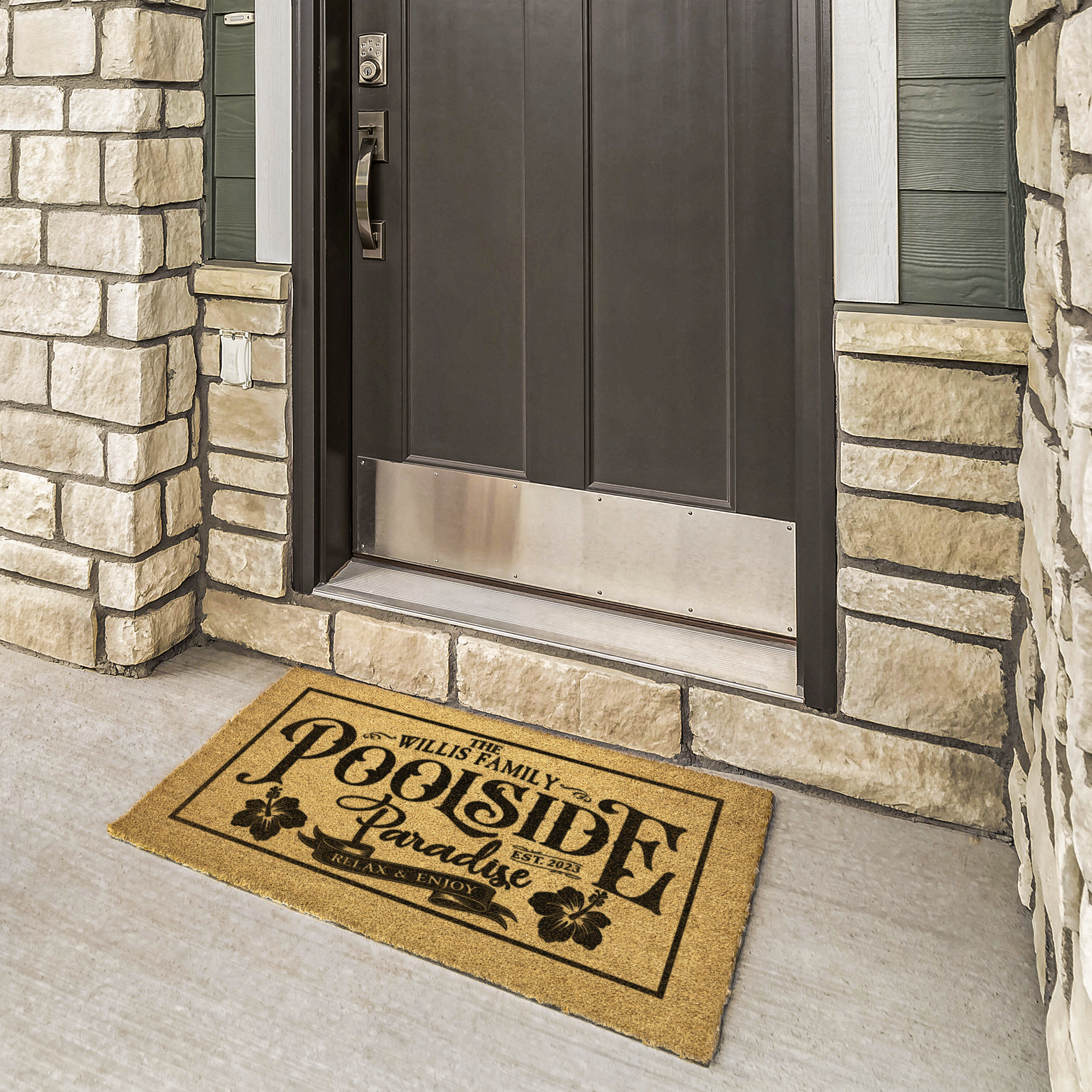 Pool coir welcome mat reading Poolside Paradise at a bronze door framed by cream stone