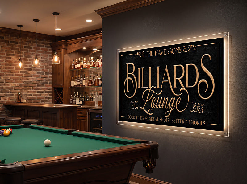 Pool table room decor sign on an exposed brick wall above a green felt pool table in a finished basement lounge