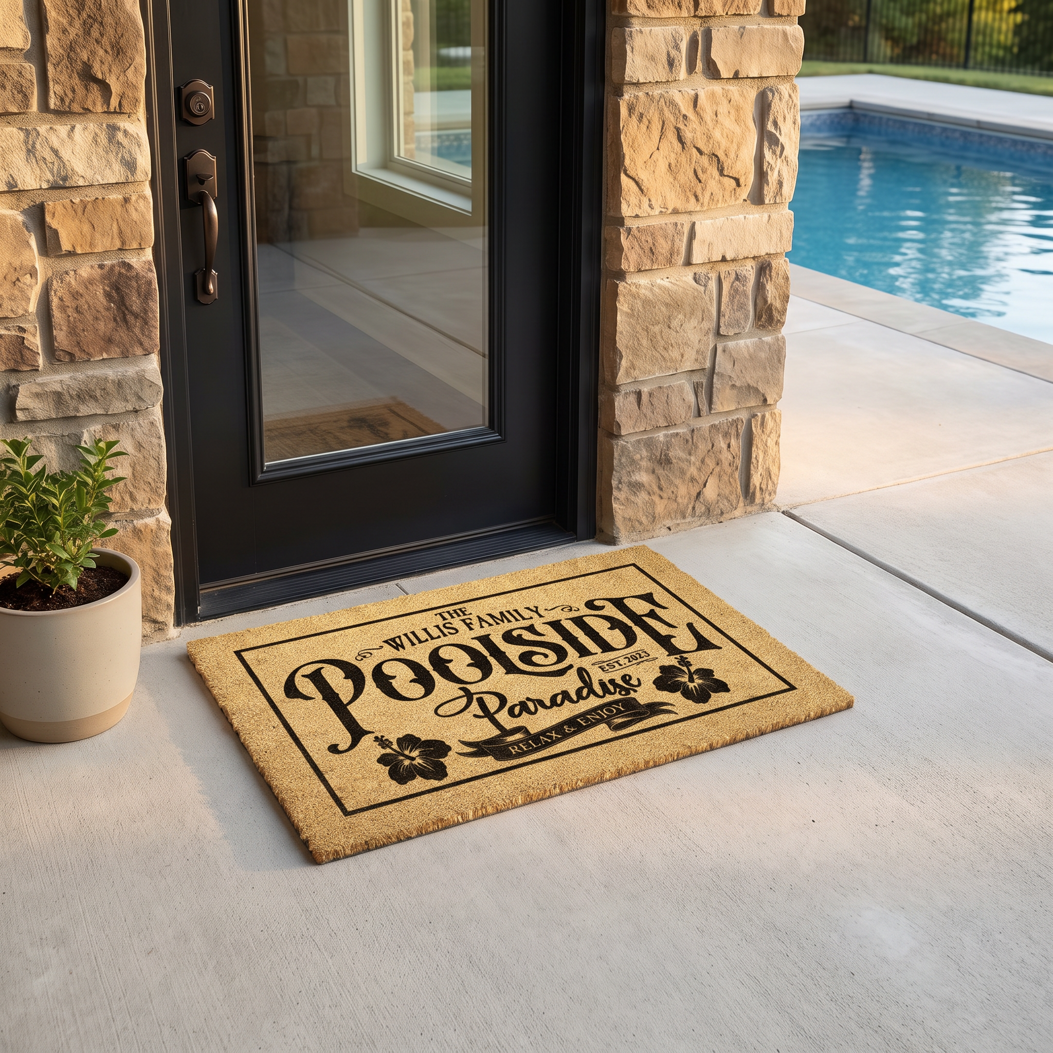 Poolside Paradise doormat with family name and est year at a black door on a stone pool house