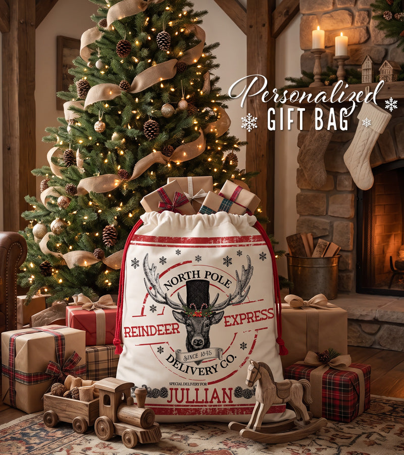 Reindeer Express Santa sack personalized with a name, beside a stone fireplace and Christmas tree