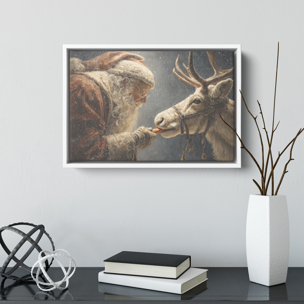 Old world Santa and reindeer canvas in a white frame above a dark console with a white vase of bare branches