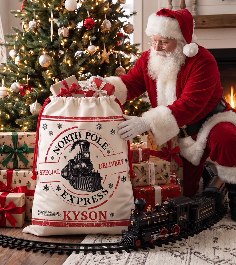 Santa sack personalized with a name, North Pole Express train design, packed with Christmas presents