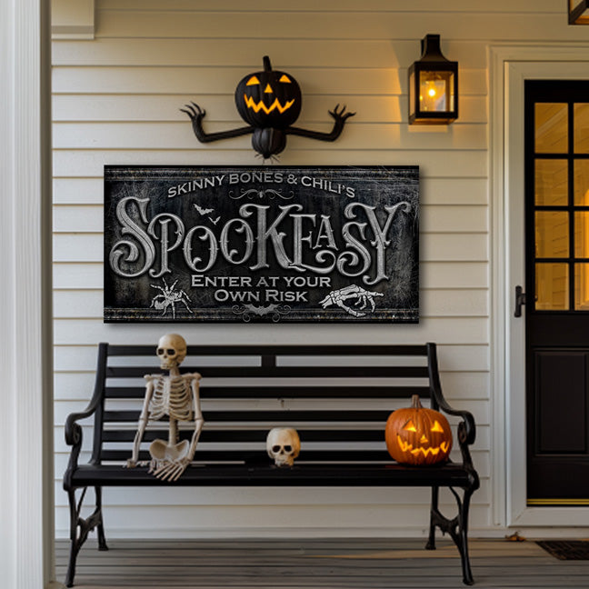 Spookeasy Halloween Sign on dark stone background with family name and a spider with a hand