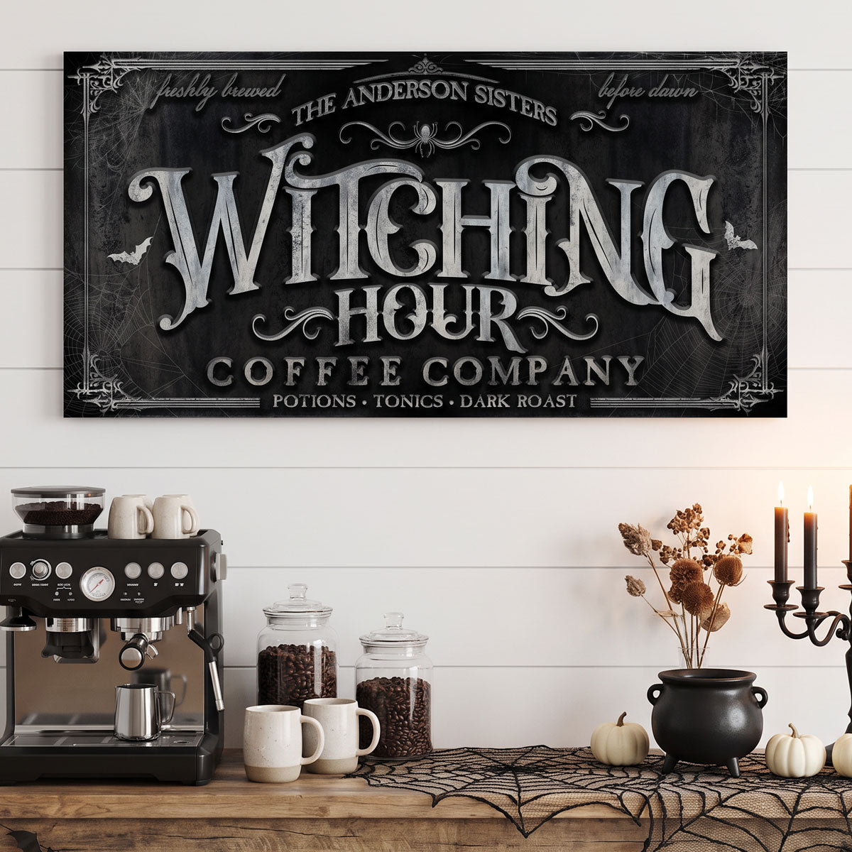 Witching Hour coffee sign above a kitchen coffee bar with an espresso machine, canisters, white pumpkins and a candelabra