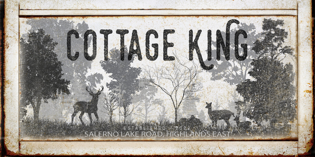 Reads [Cottage King] with a woodsy picture with deer on metal or canvas