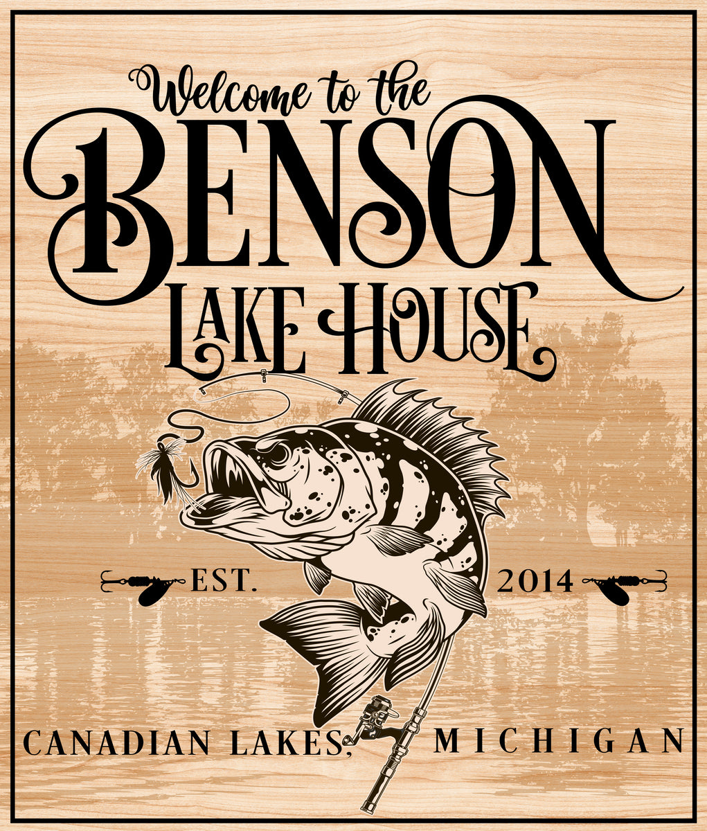 Reads Welcome to the [Family name] Lake House with a fish jumping form a lure. Est [your year] [your city and state]