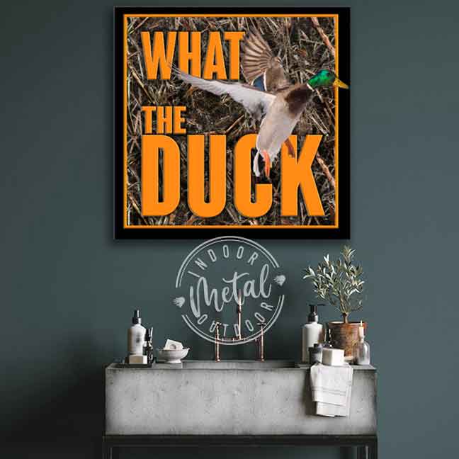 Duck Hunting Decor mallard duck flying out of duck camo and the words: What the Duck
