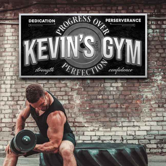 Home Gym Decor Signs that have silver letters on black stone background. With a metal weight in back round and words Kevin's Gym (Progress over perfection)