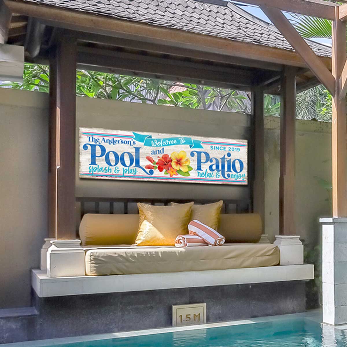 Pool Signs Personalized on white washed wood with the words [family name] Pool and Patio with tropical flowers and the words splash play, relax and enjoy