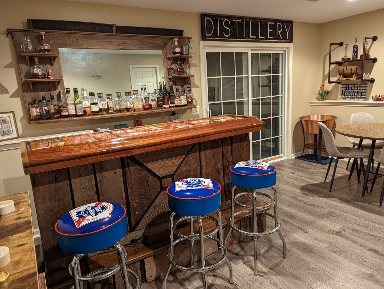 Basement Bar Decor Black Distillery Sign on canvas with words Distillery (Whiskey) in white lettering.