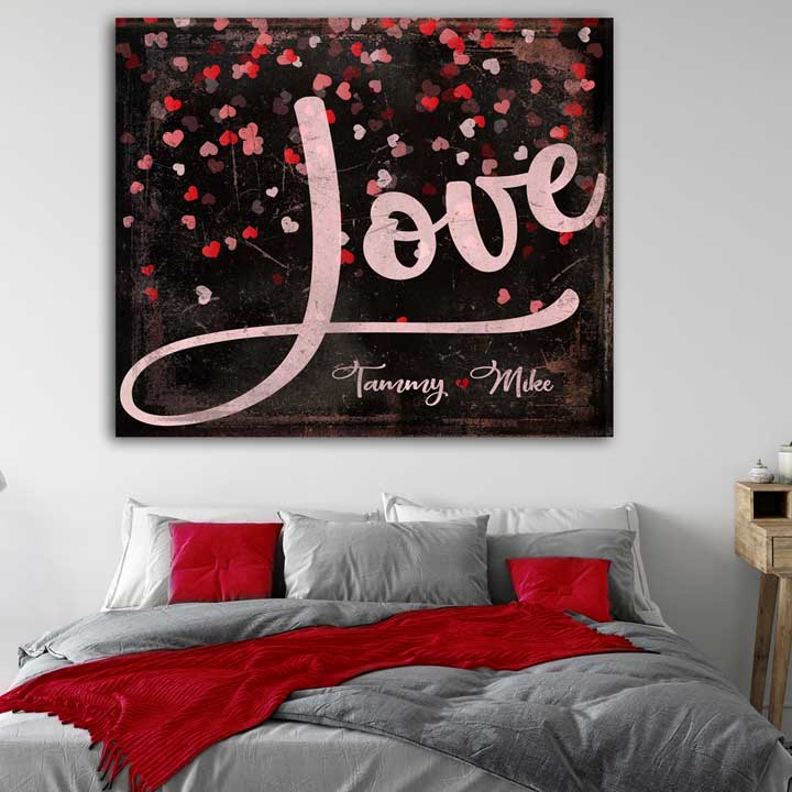 Valentines Day Wall Art on distressed black canvas with the words LOVE and [personalized names] with red hearts