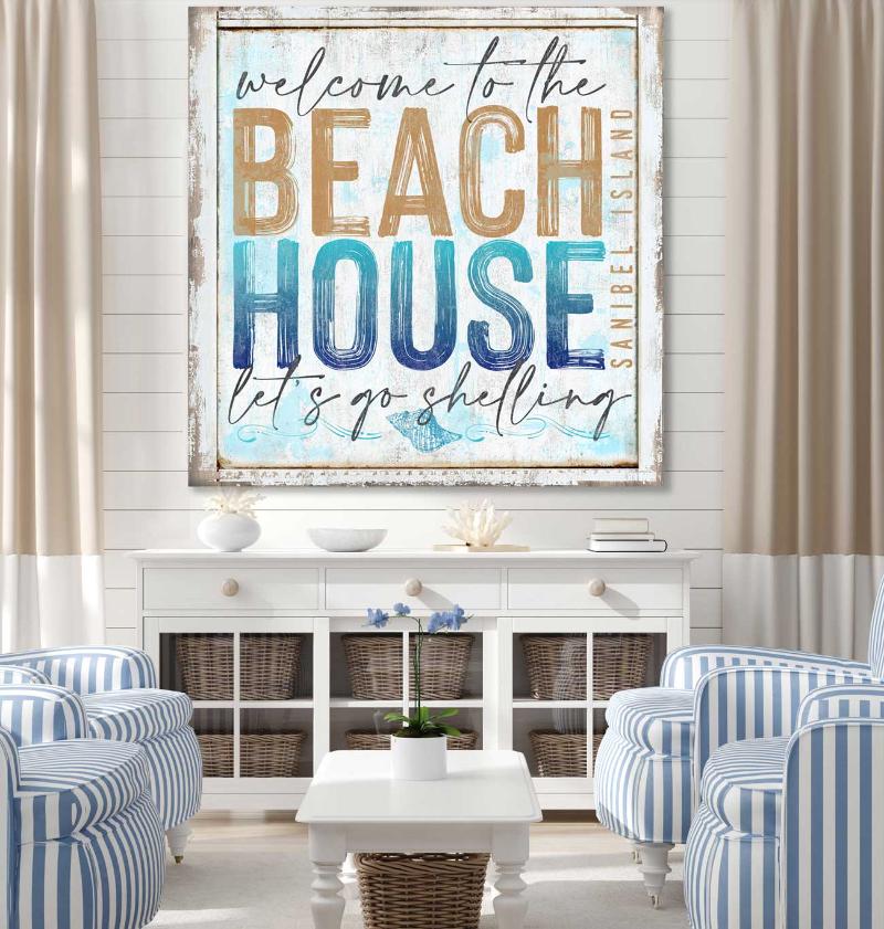 coastal decor for a beach house on distress wood frame on white chippy paint with the words [ Welcome to the Beach House Sanibel Island, Let's go Shelling}