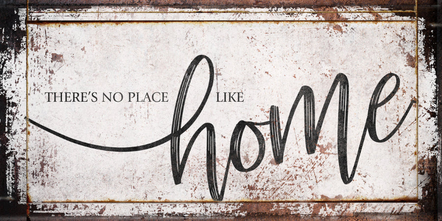 Modern farmhouse decor of distressed wood and the words: There's no place like Home