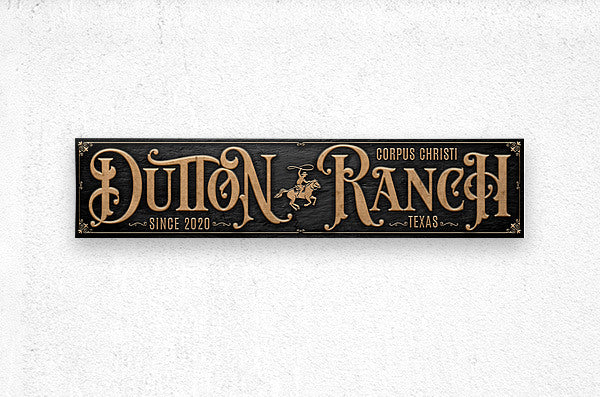 western wall decor of a ranch sign on black background and gold lettering